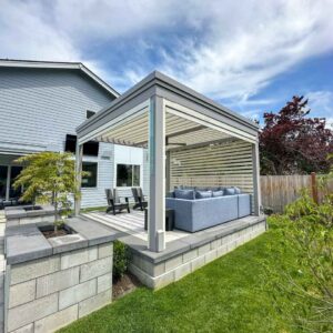 Custom pergola with motorized solar shades, custom fans, outdoor accessories, motorized louvers