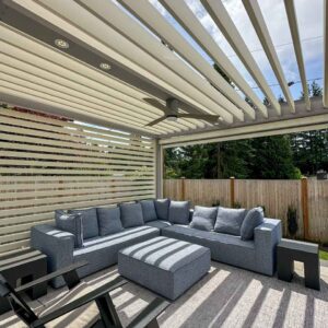 Custom pergola with motorized solar shades, custom fans, outdoor accessories, motorized louvers