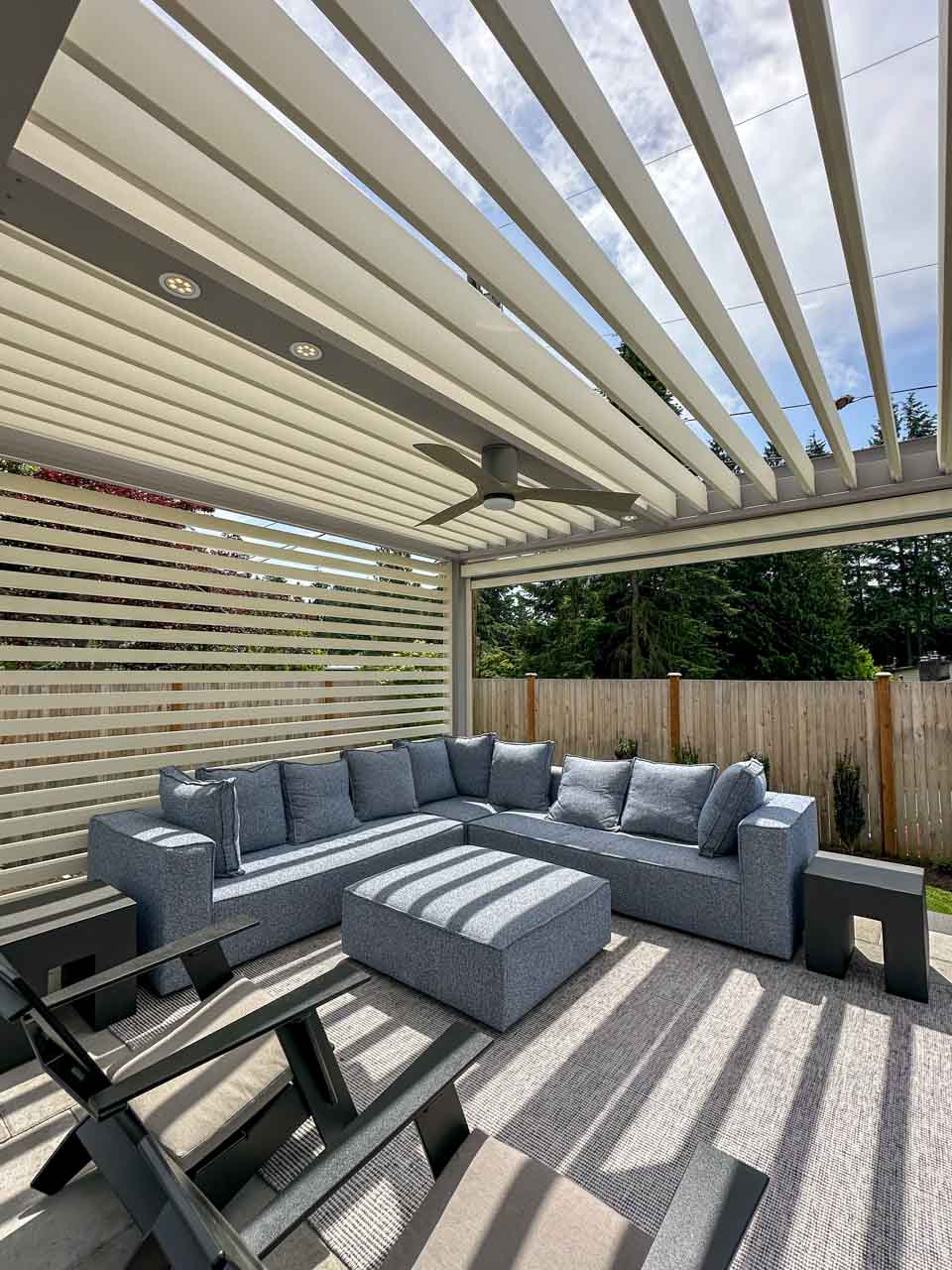 Custom pergola with motorized solar shades, custom fans, outdoor accessories, motorized louvers