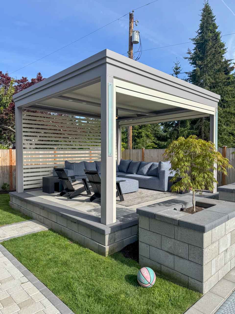 Custom pergola with motorized solar shades, custom fans, outdoor accessories, motorized louvers