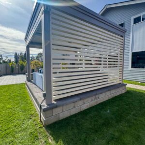 Custom pergola with motorized solar shades, custom fans, outdoor accessories, motorized louvers