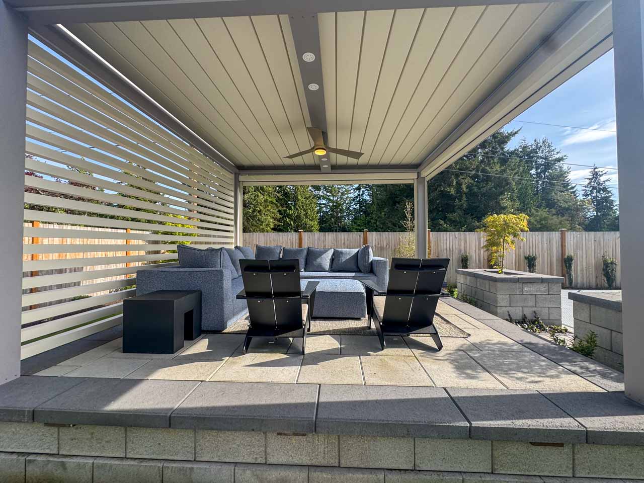 Custom pergola with motorized solar shades, custom fans, outdoor accessories, motorized louvers