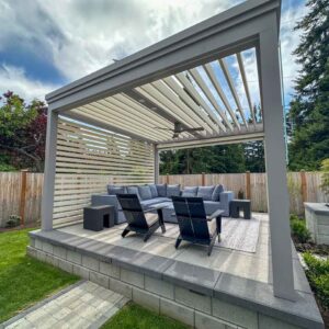 Custom pergola with motorized solar shades, custom fans, outdoor accessories, motorized louvers